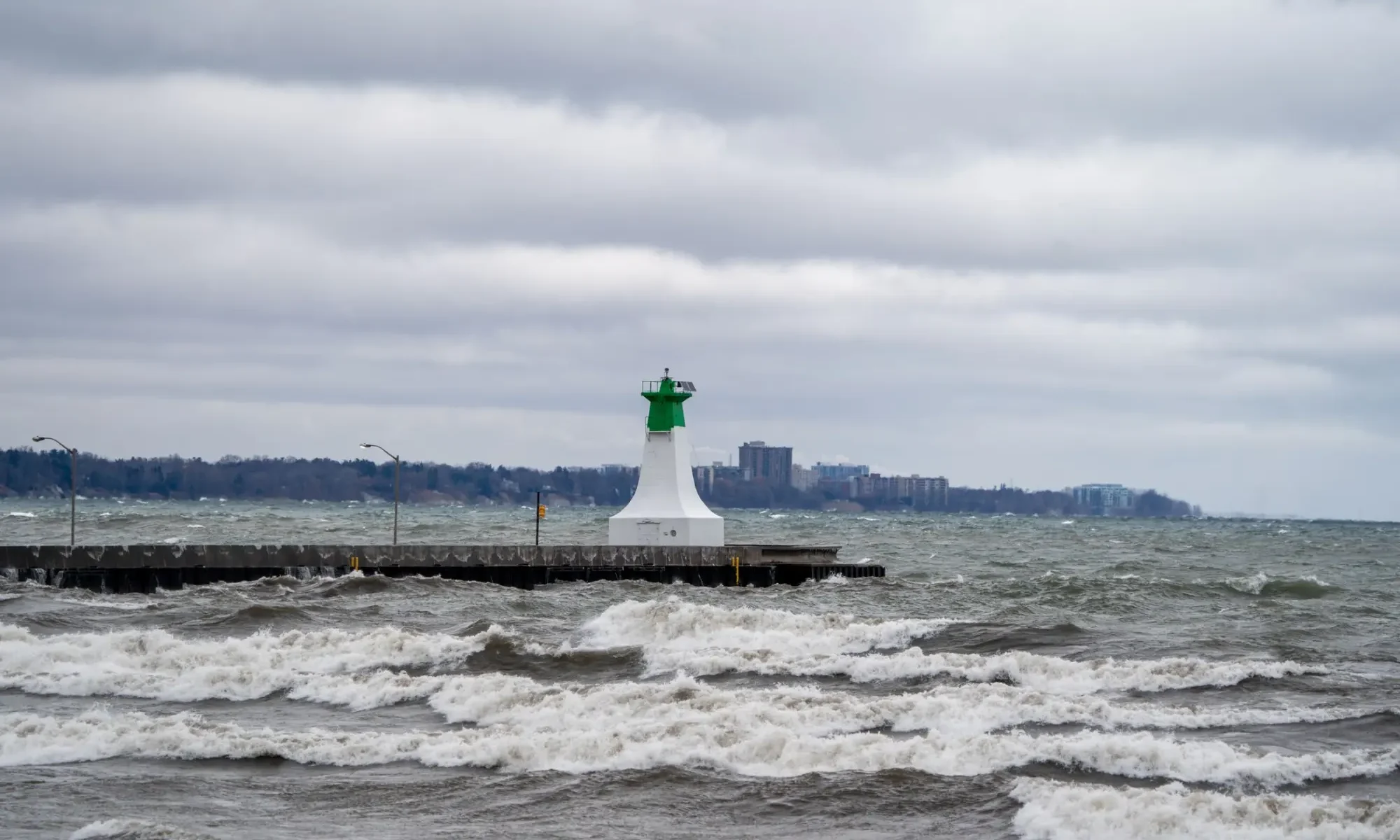 Lighthouse and waves on Lake Ontario on a stormy day