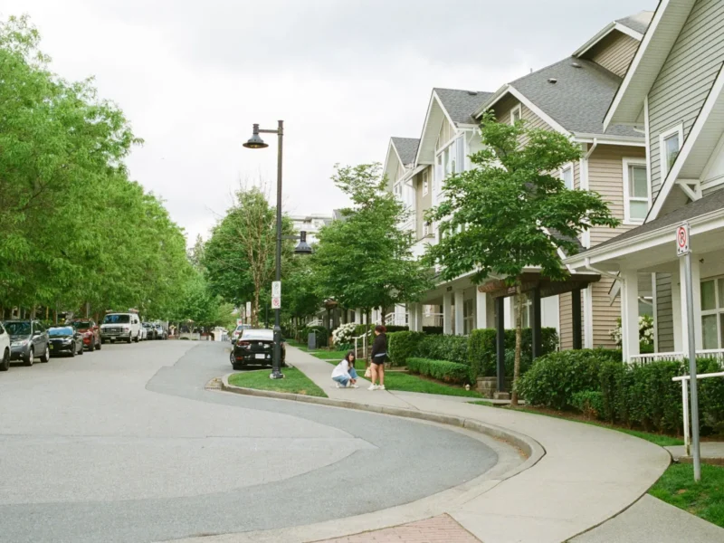 Newer homes along a curving street in a growing suburb