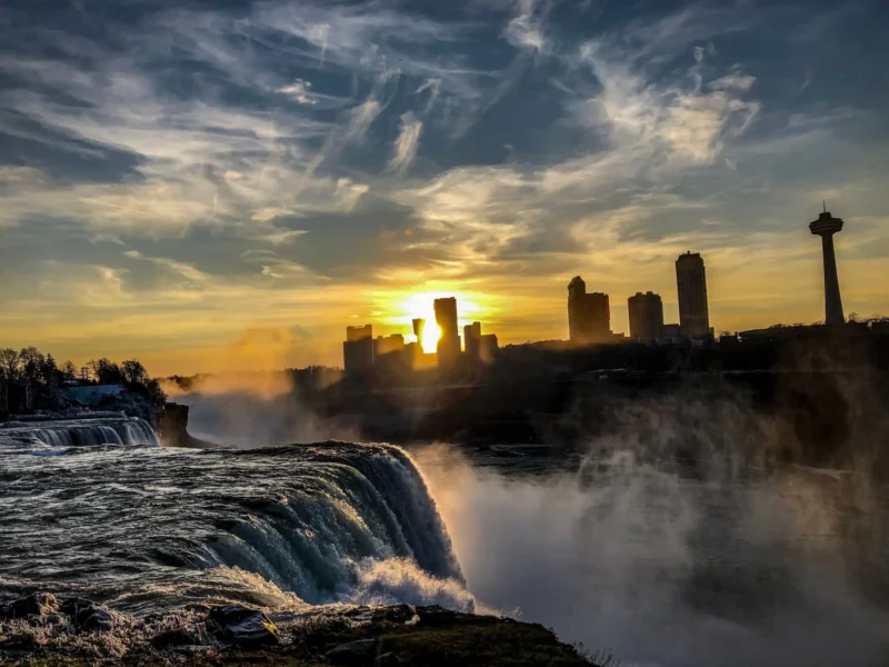 Niagara Falls and the city skyline at sunset